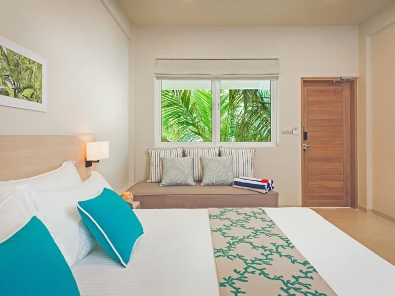 Garden Room - Elegant 2-guest oceanfront accommodation at Malahini Kuda Bandos Resort featuring premium furnishings and stunning Maldives views