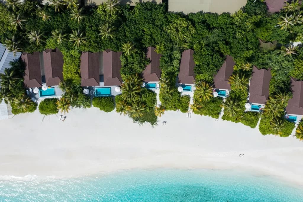 The Standard Huruvalhi Maldives - 5-star resort in Raa Atoll featuring pristine beaches, crystal-clear lagoon, and overwater villas