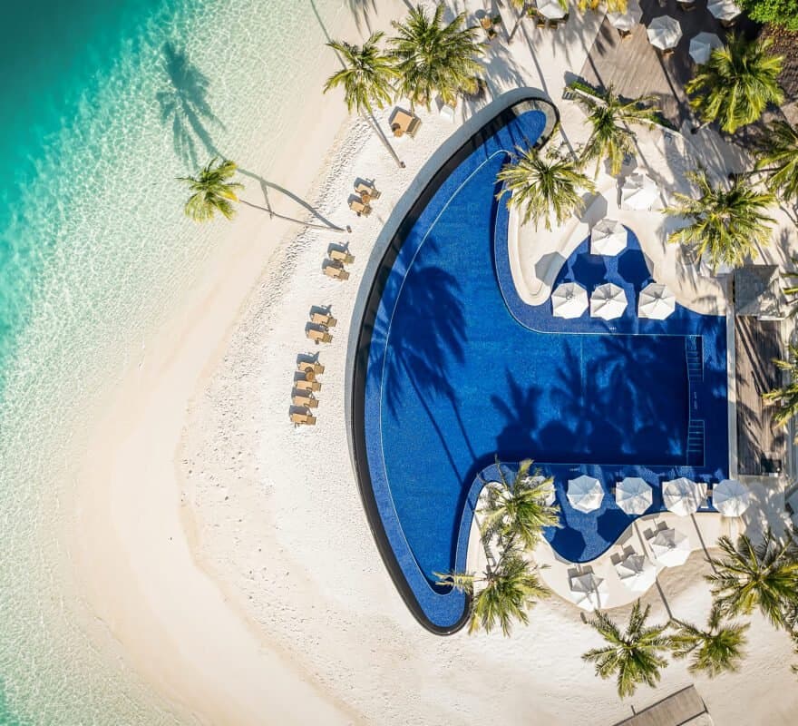 Glittering Pools - State-of-the-art sportsactivitylocation facility at Conrad Maldives Rangali Island with luxurious tropical surroundings and premium amenities