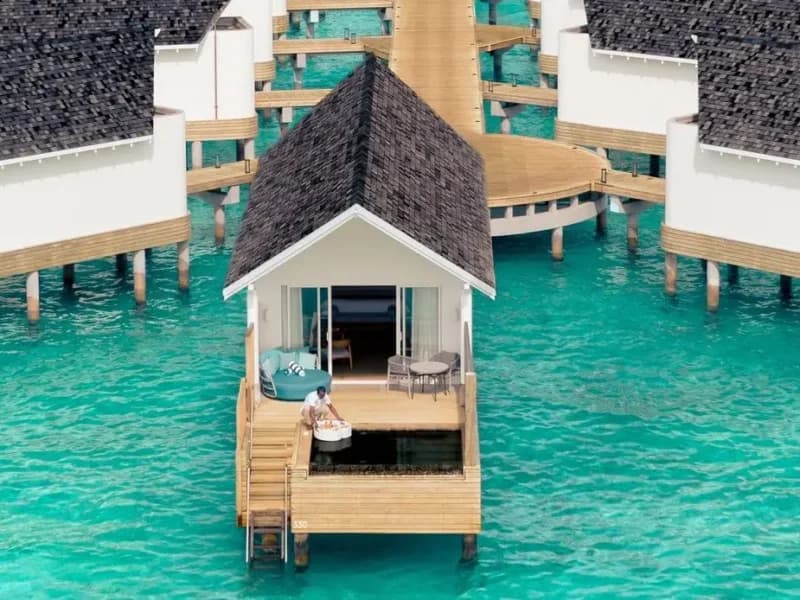 Deluxe Water Villa with Pool - Elegant 1-guest oceanfront accommodation at RAAYA By Atmosphere featuring premium furnishings and stunning Maldives views