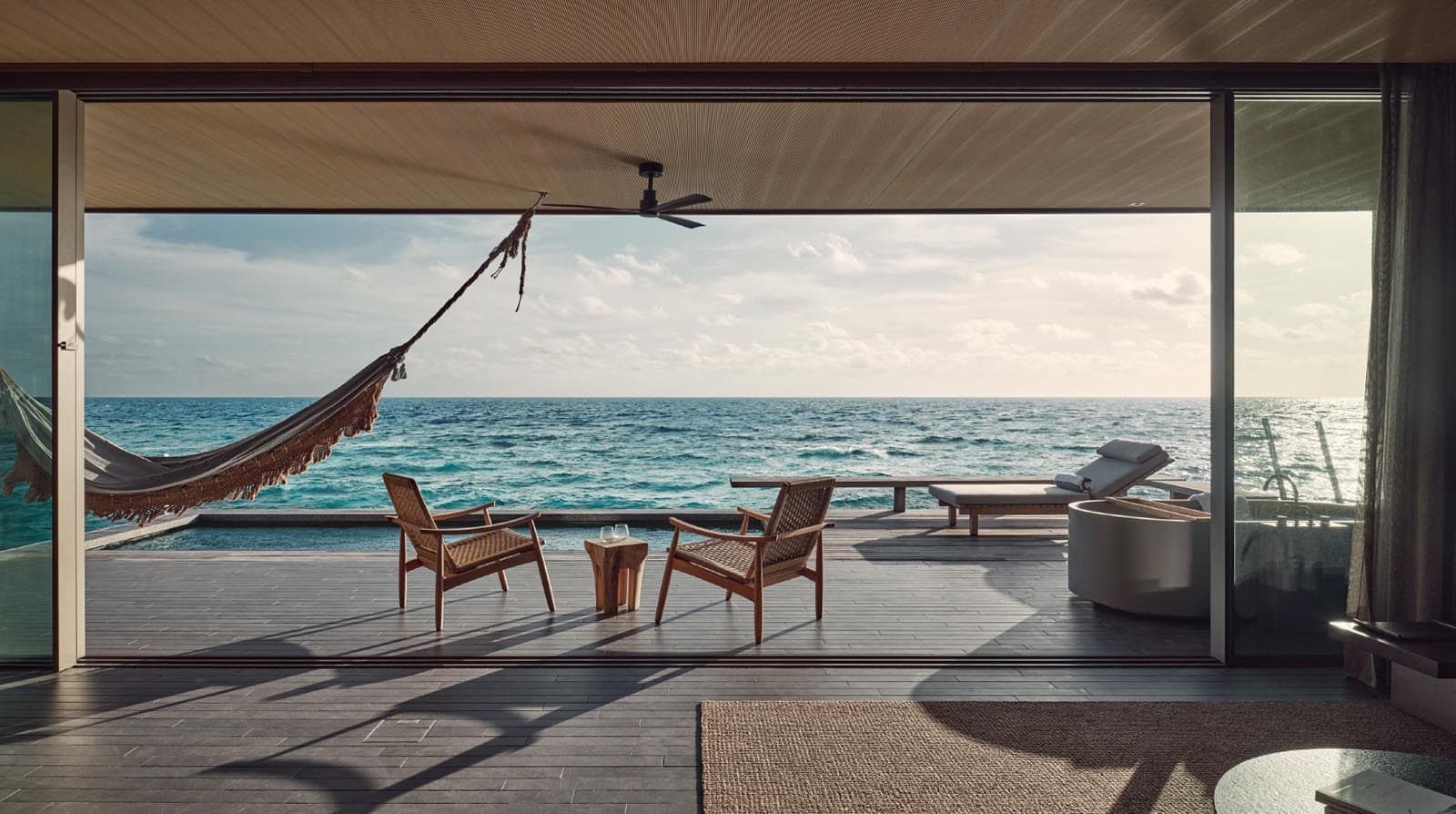 One Bedroom Sunset Water Pool Villa - Elegant 1-guest oceanfront accommodation at Patina Maldives featuring premium furnishings and stunning Maldives views