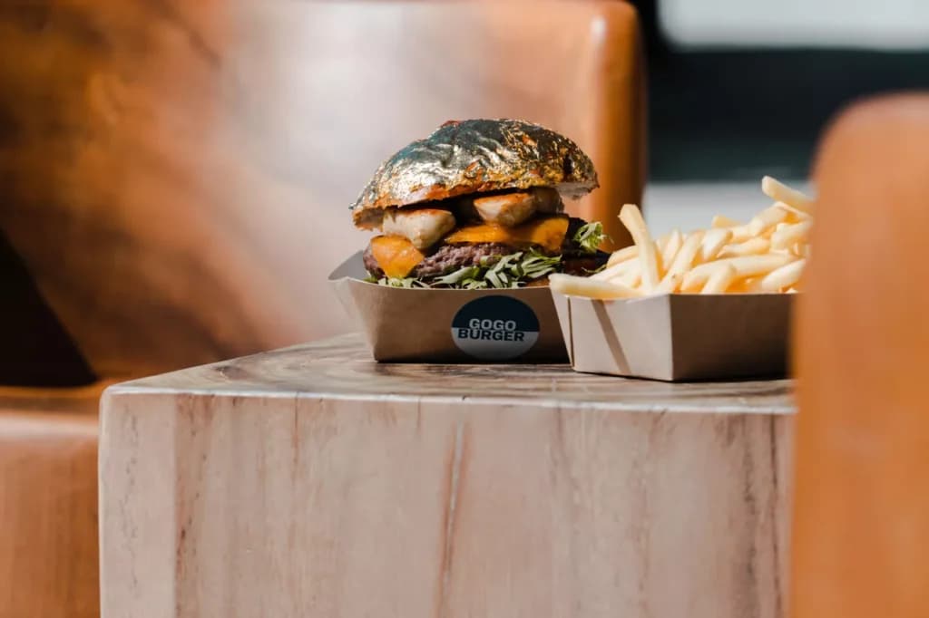 Go Go Burger - Sophisticated fine dining restaurant at Patina Maldives featuring elegant tropical ambiance and gourmet cuisine