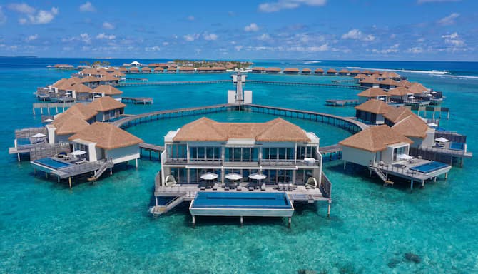 Three Bedroom Presidential Overwater Villa with Pool - Elegant 1-guest oceanfront accommodation at Radisson Blu Resort featuring premium furnishings and stunning Maldives views