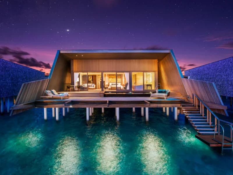 Sunset Overwater Villa - Elegant 1-guest oceanfront accommodation at The St. Regis Maldives Vommuli Resort featuring premium furnishings and stunning Maldives views