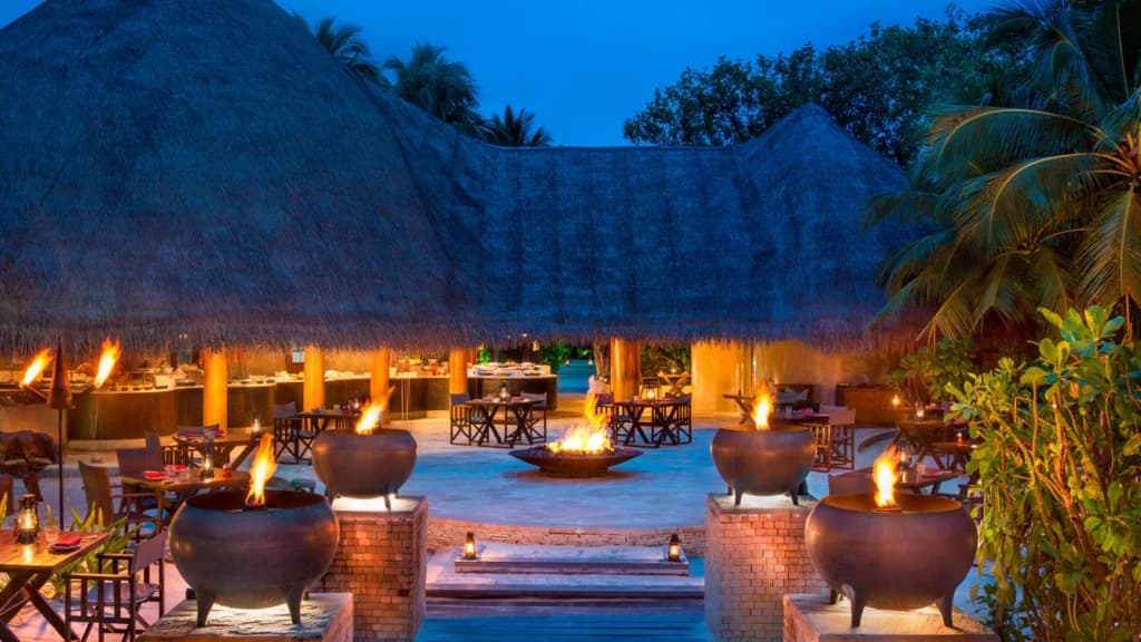 FIRE - Sophisticated fine dining restaurant at W Maldives featuring elegant tropical ambiance and gourmet cuisine
