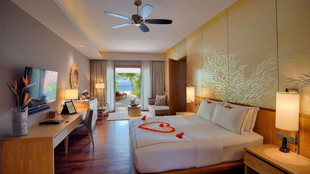 Beach Suite - Elegant 1-guest oceanfront accommodation at Lily Beach Resort & Spa featuring premium furnishings and stunning Maldives views