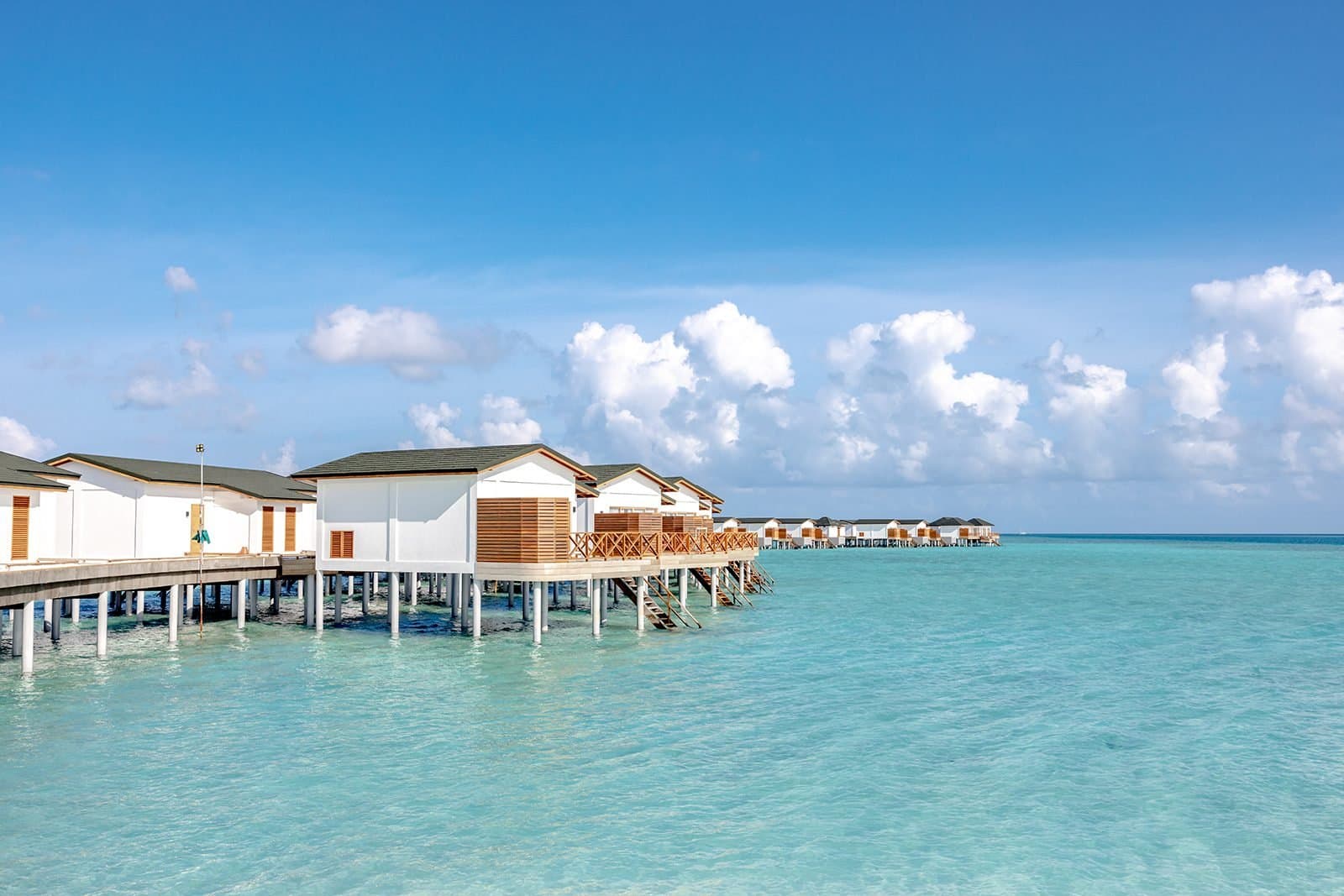 Lagoon Suite - Elegant 1-guest oceanfront accommodation at Joy Island Maldives featuring premium furnishings and stunning Maldives views