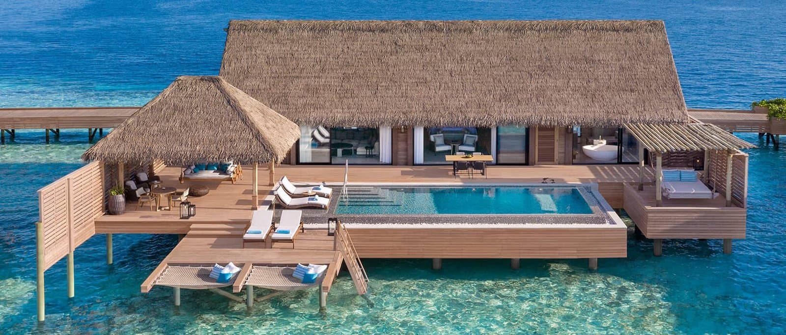Two Queen Bedded Grand Overwater Villa with Pool - Elegant 1-guest oceanfront accommodation at Waldorf Astoria Maldives Ithaafushi featuring premium furnishings and stunning Maldives views