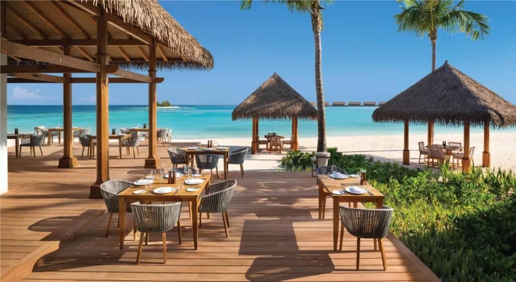 Tasting Table - Sophisticated International / Asian & European restaurant at Waldorf Astoria Maldives Ithaafushi featuring elegant tropical ambiance and gourmet cuisine