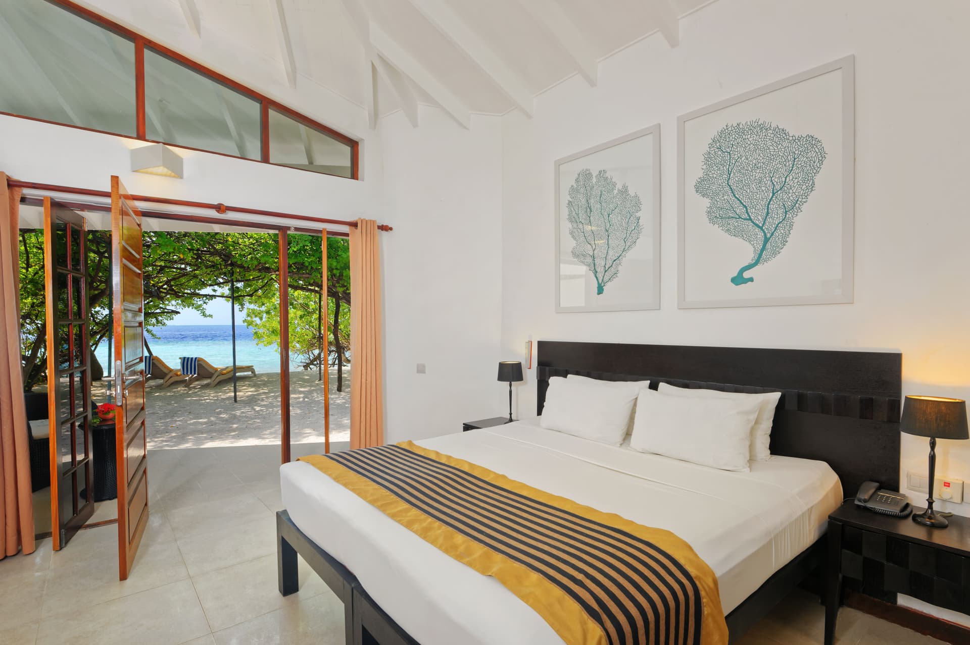 Superior Beach Bunglow - Elegant 2-guest oceanfront accommodation at Embudu Village featuring premium furnishings and stunning Maldives views