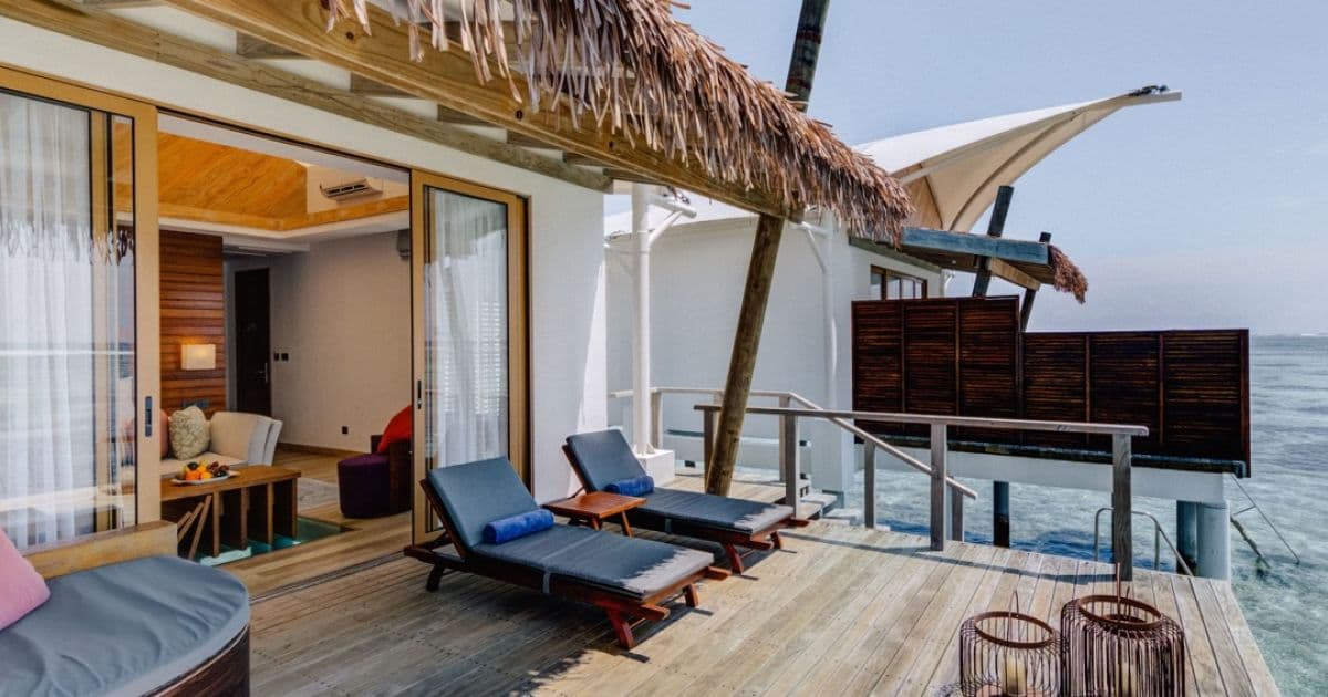 Sunset Water Bungalow - Elegant luxury oceanfront accommodation at Cinnamon Hakuraa Huraa Maldives featuring premium furnishings and stunning Maldives views