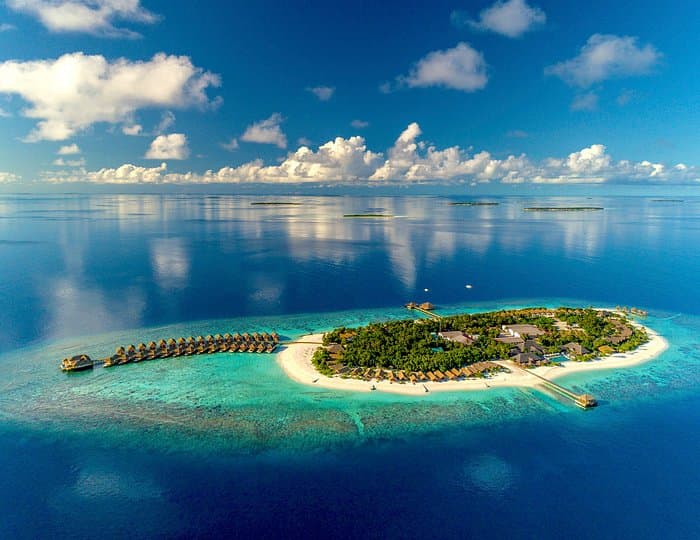 Kudafushi Resort & Spa - 4-star resort in Raa Atoll featuring pristine beaches, crystal-clear lagoon, and overwater villas