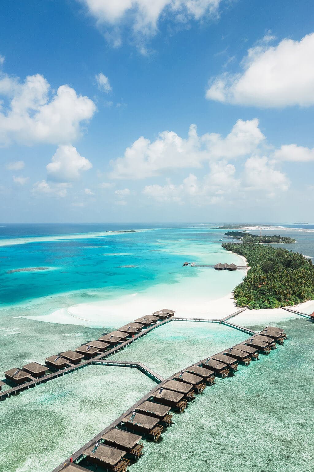 Medhufushi Island Resort - 4-star resort in Meemu Atoll featuring pristine beaches, crystal-clear lagoon, and overwater villas