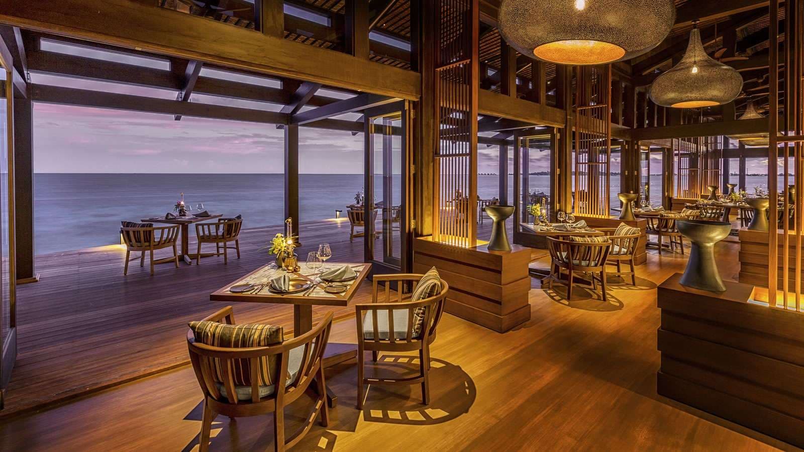 The Retreat Bar - Sophisticated Bar restaurant at Kudadoo Maldives Private Island featuring elegant tropical ambiance and gourmet cuisine