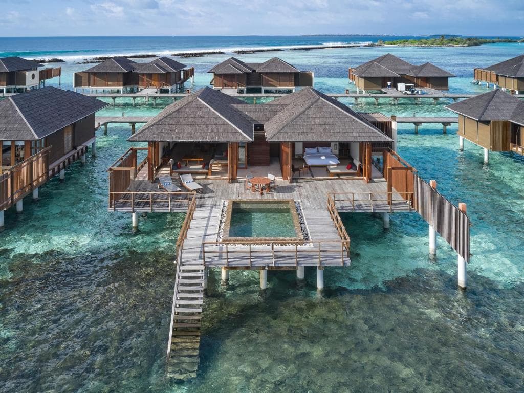 Water Villa - Elegant luxury oceanfront accommodation at Villa Nautica Maldives (Paradise Island Resort) featuring premium furnishings and stunning Maldives views