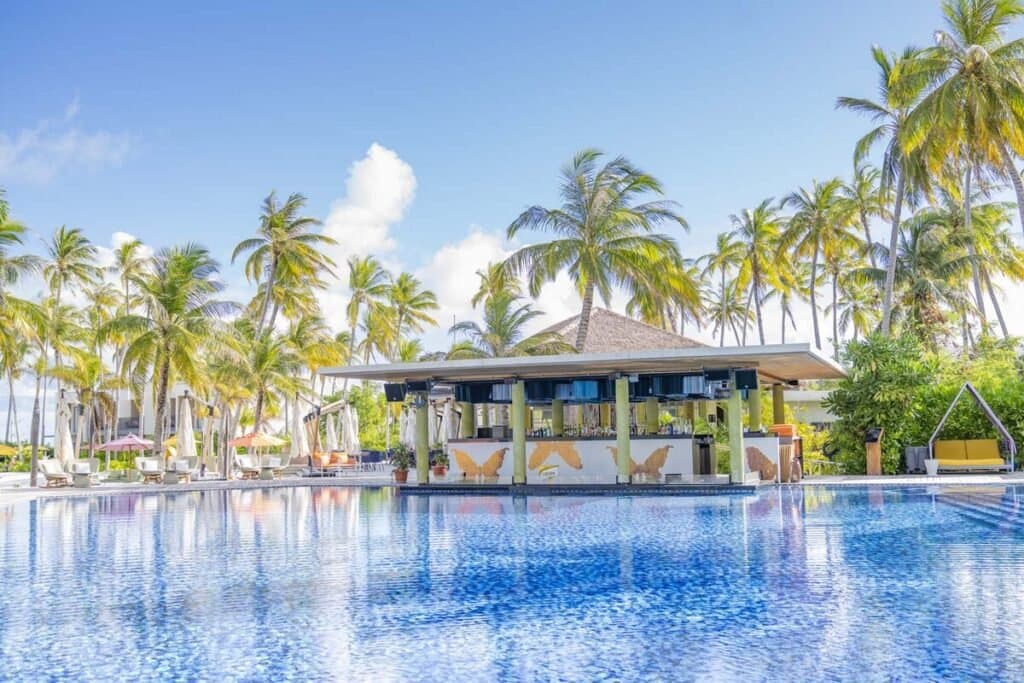 Pool Bar - Sophisticated Snacks & Beverages restaurant at Hard Rock Hotel Maldives featuring elegant tropical ambiance and gourmet cuisine