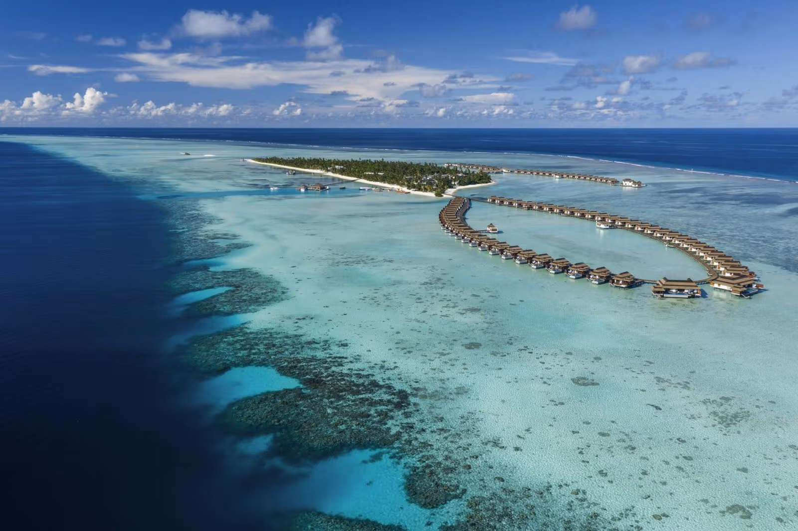 Pullman Maldives Maamutaa - 5-star resort in Gaafu Alifu Atoll featuring pristine beaches, crystal-clear lagoon, and overwater villas