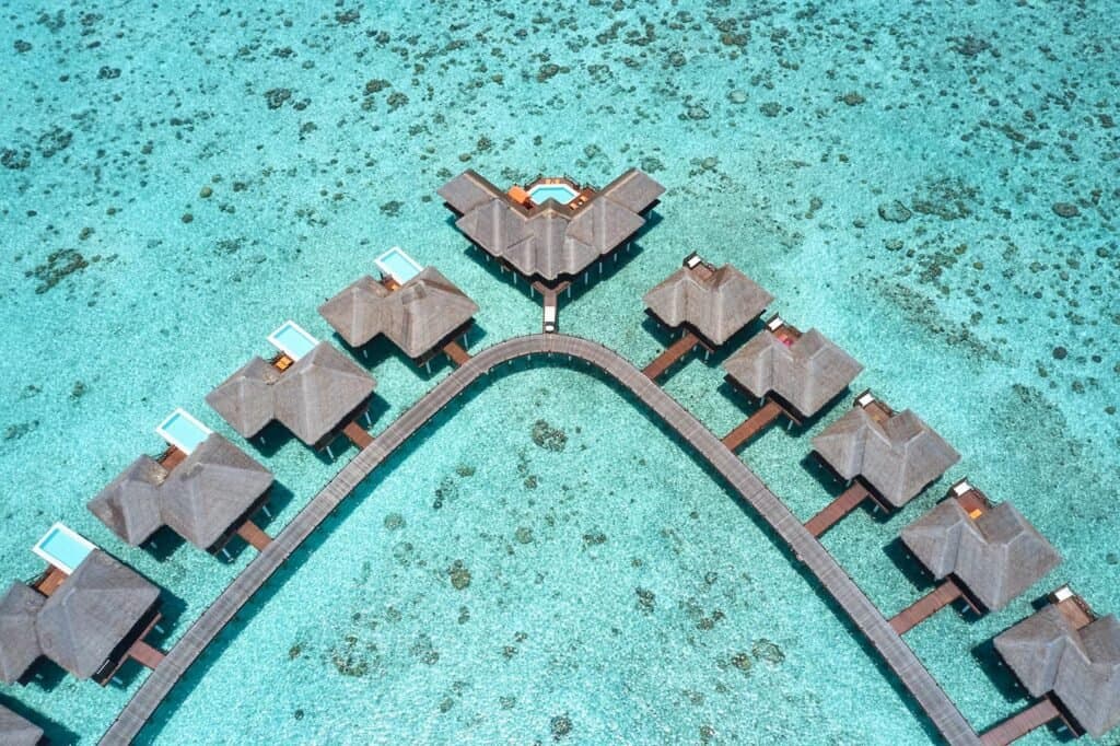 Sun Siyam Vilu Reef - 5-star resort in Dhaalu Atoll featuring pristine beaches, crystal-clear lagoon, and overwater villas