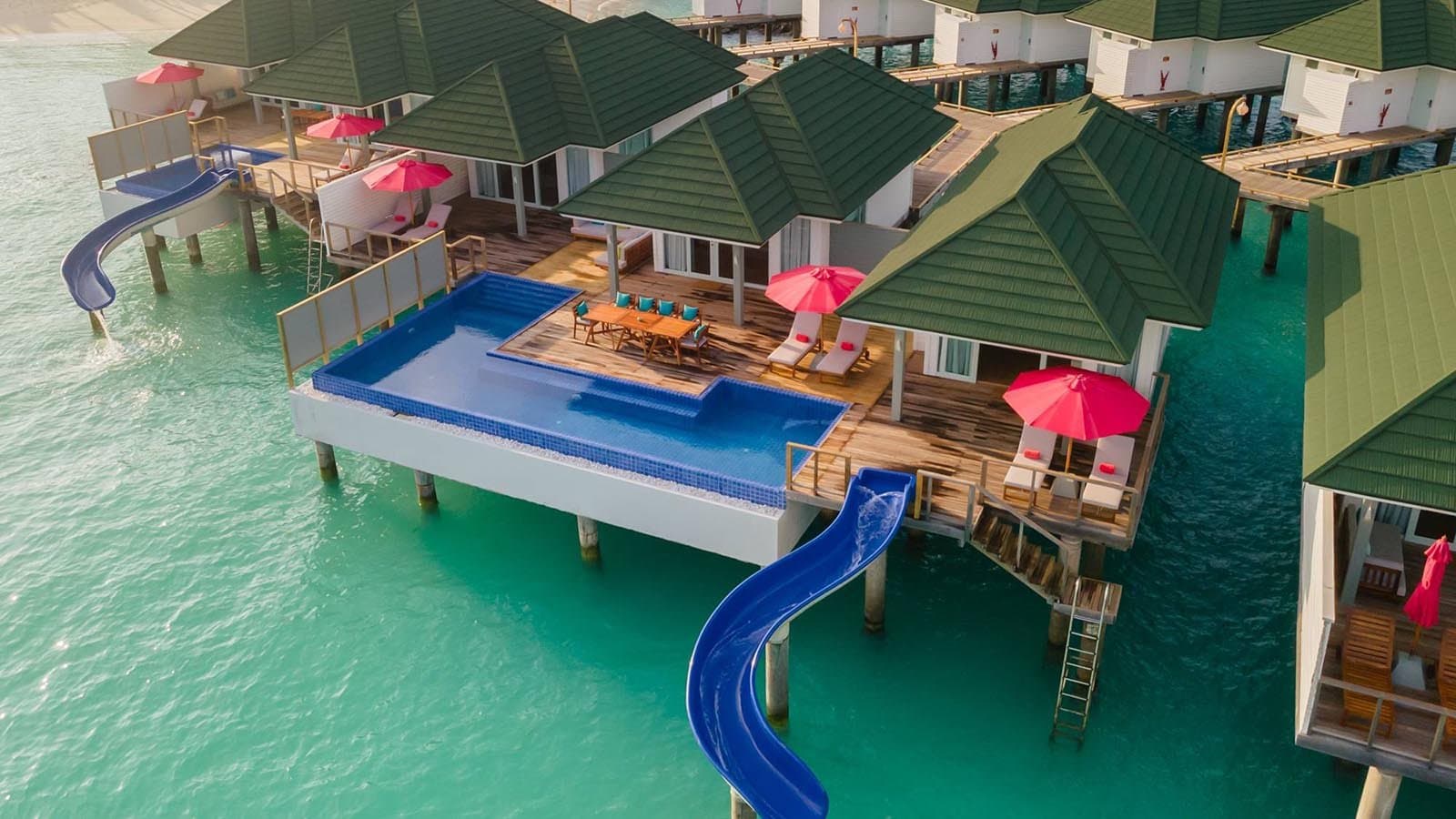 Three Bedroom Lagoon Villa with Pool + Slide - Elegant 1-guest oceanfront accommodation at Siyam World Maldives featuring premium furnishings and stunning Maldives views