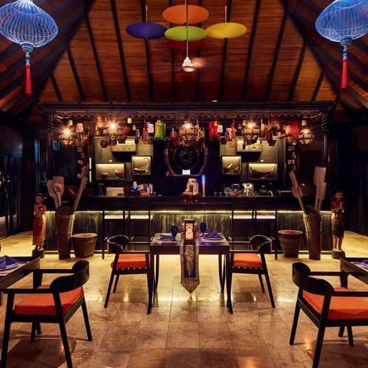 Siyam Orchid - Sophisticated fine dining restaurant at Sun Siyam Olhuveli featuring elegant tropical ambiance and gourmet cuisine
