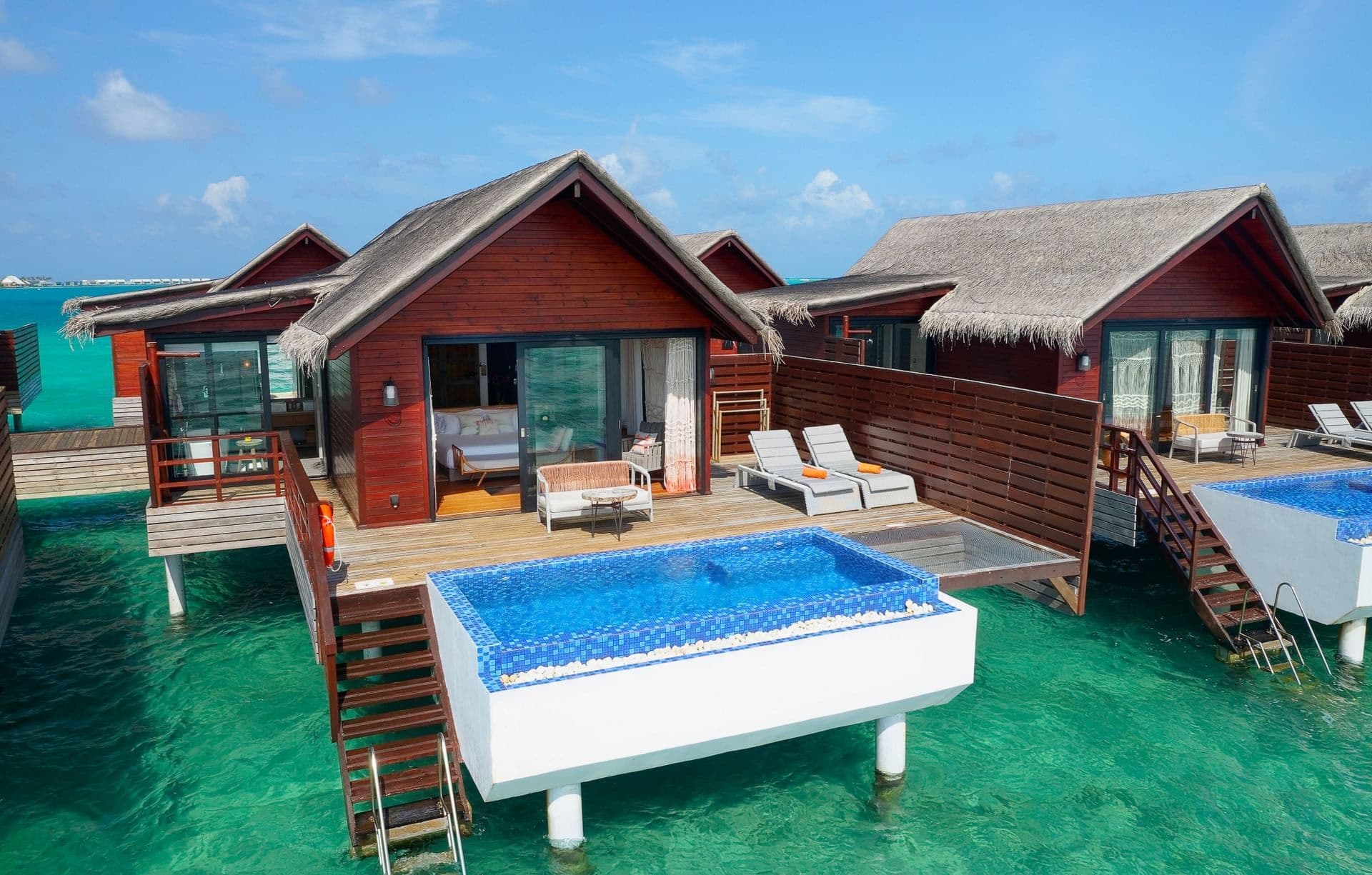 Pool Water Villa - Elegant luxury oceanfront accommodation at Grand Park Kodhipparu Maldives featuring premium furnishings and stunning Maldives views