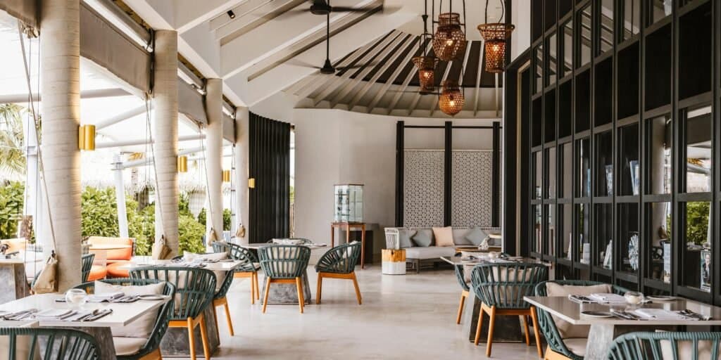 The Retreat - Sophisticated Cocktails & Afternoon Tea restaurant at InterContinental Maldives Maamunagau Resort featuring elegant tropical ambiance and gourmet cuisine
