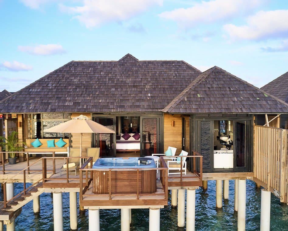 Horizon Water Villa - Elegant 1-guest oceanfront accommodation at Sun Siyam Irufushi featuring premium furnishings and stunning Maldives views